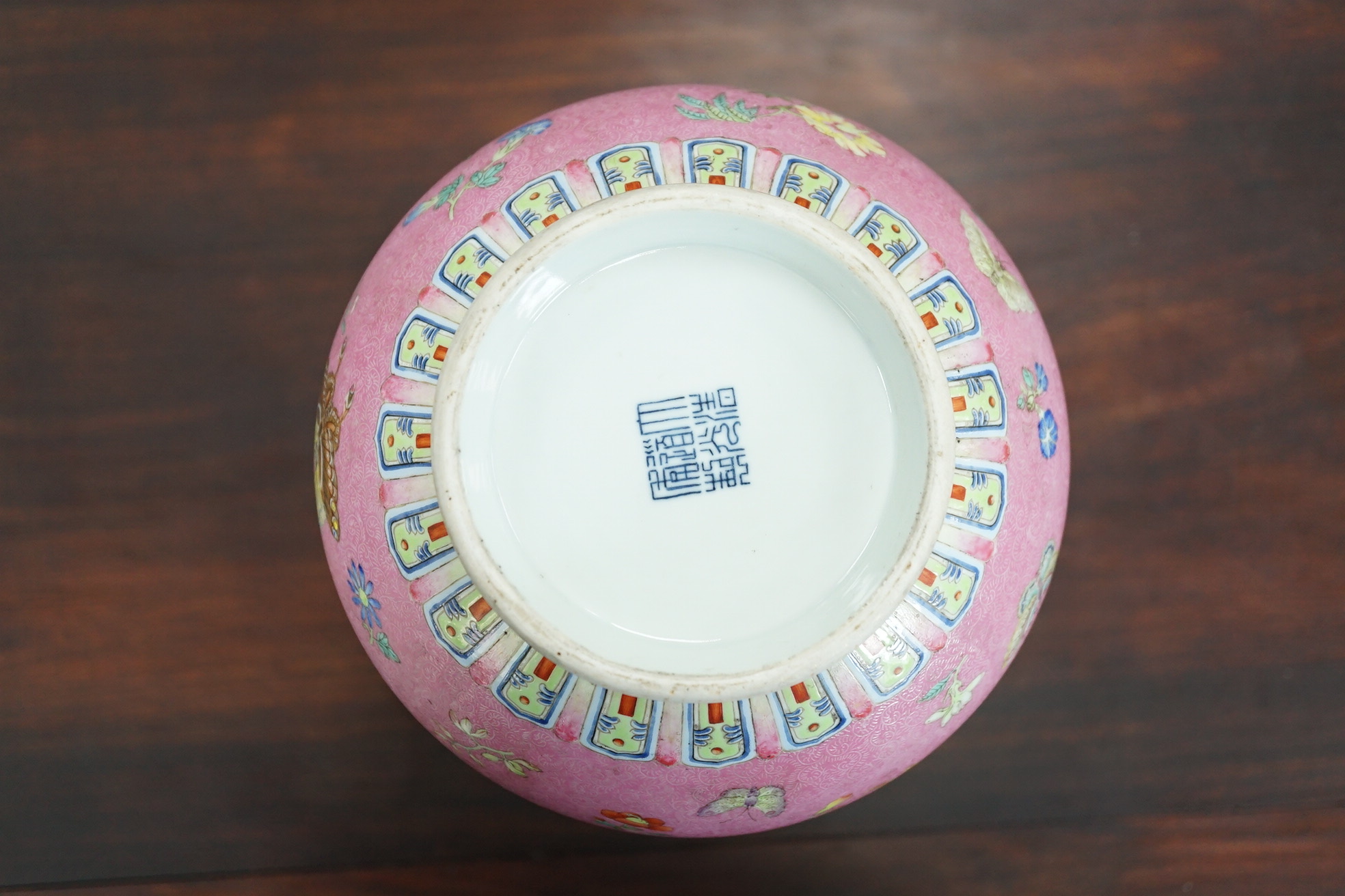 A Chinese pink-ground sgraffito pear-shaped vase, yuhuchunping, Daoguang six character seal mark and of the period (1821-50)